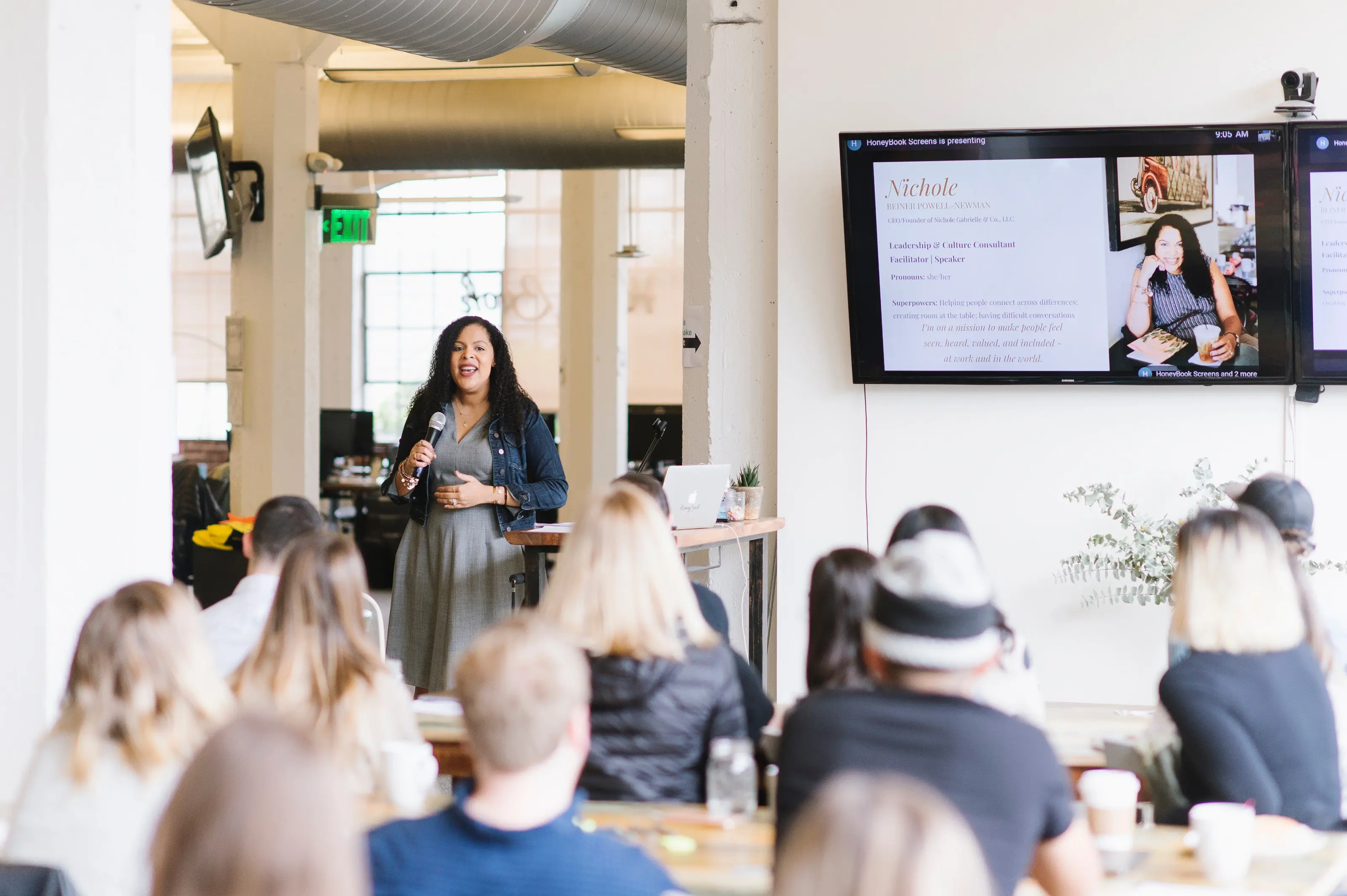 Nichole Gabrielle speaking to a room